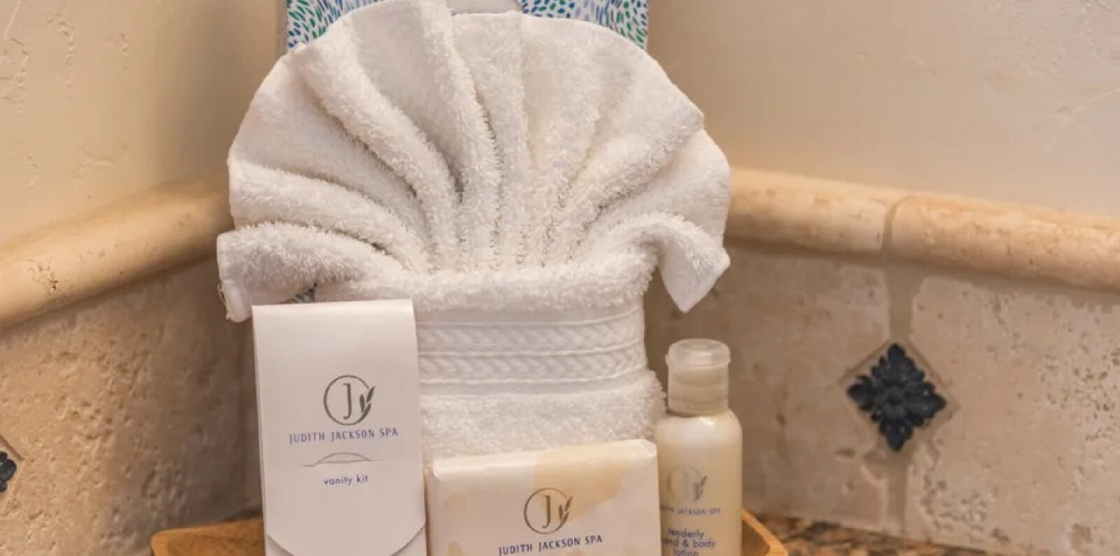 Shell styled towel - provided toiletries