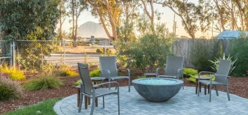 Morro Bay Rock Revival - Exterior - Fire Pit with seating and Morro Rock view