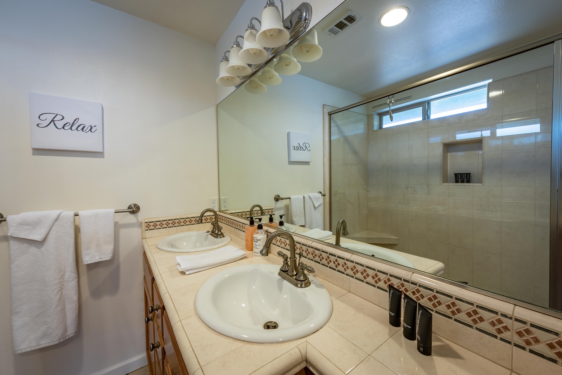 Master en suite with dual vanities and very large shower.