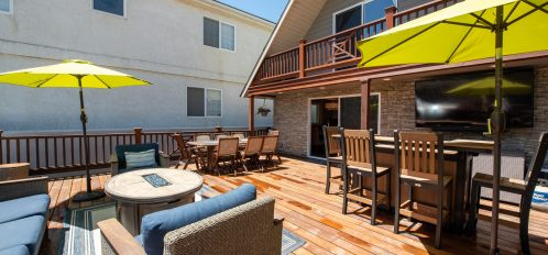 Entertainment deck with Fire pit, bar, dining table with seating for 8 and a hot tub!
