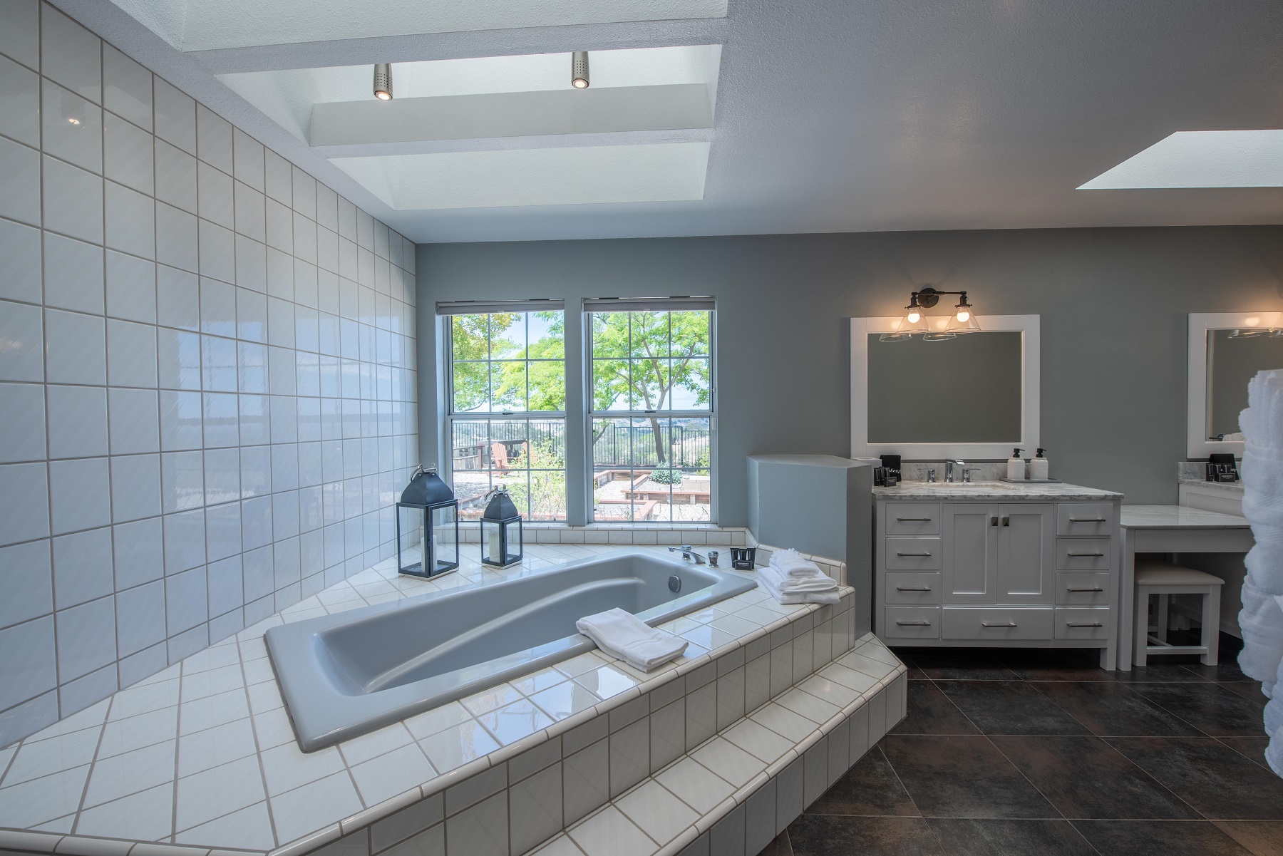 Master bath with large Jacuzzi tub. Soak while you watch a beautiful sunset