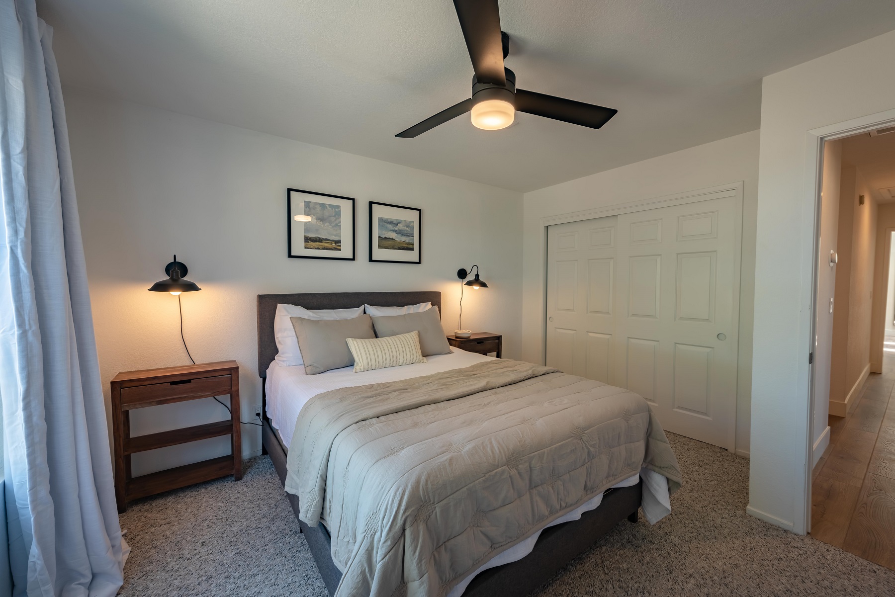 Bedroom 2 with queen bed and ceiling fan