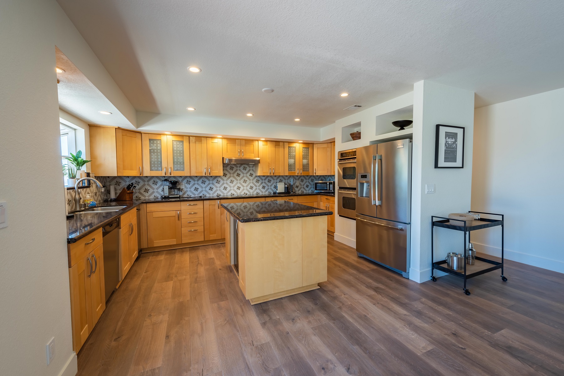Fully-stocked kitchen with all stainless steel appliances