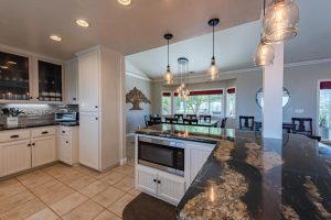 Kitchen with a plethora of cooking necessities for gourmet meals.